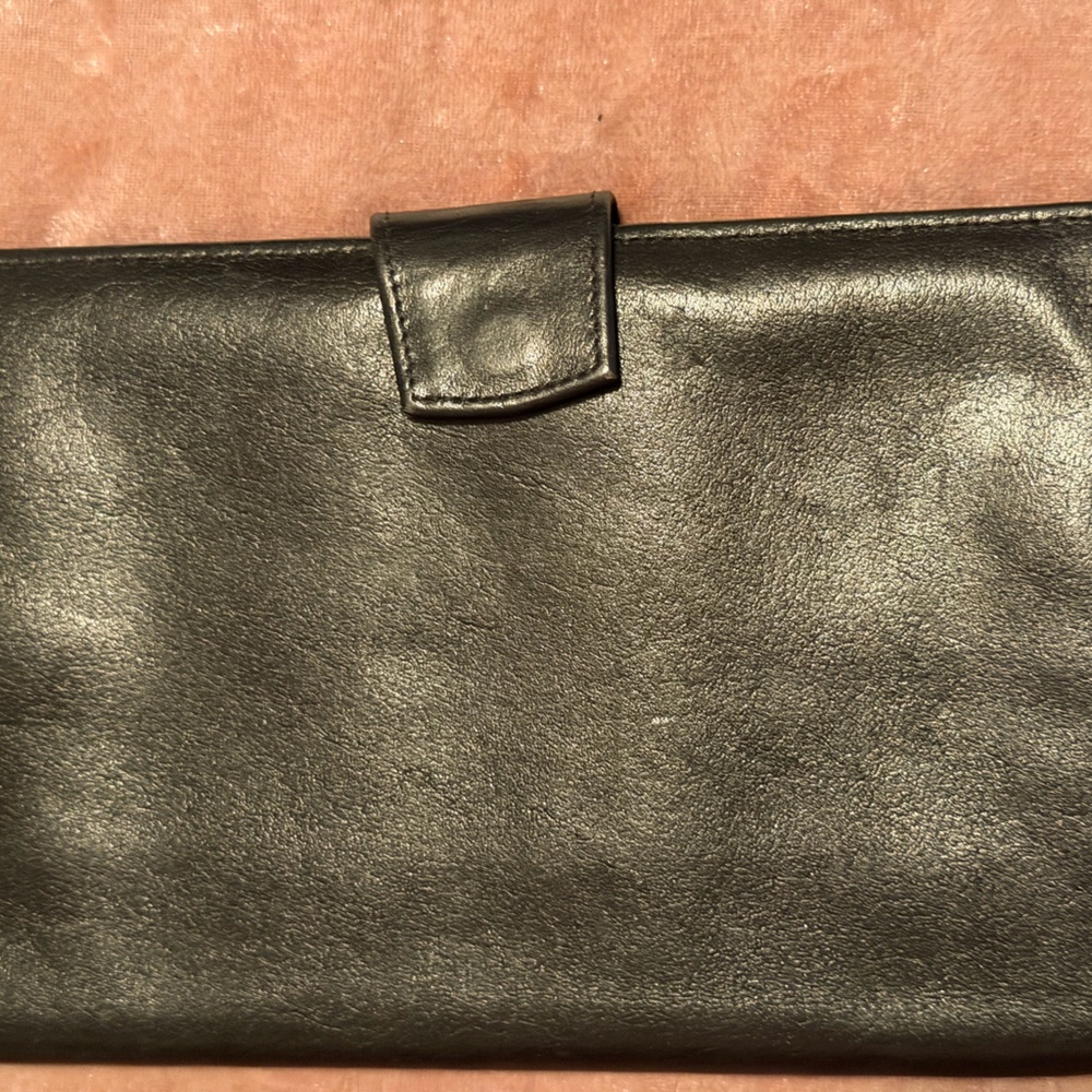 The wallet by the brand Prym. Specifically, vintage models Echt Prym